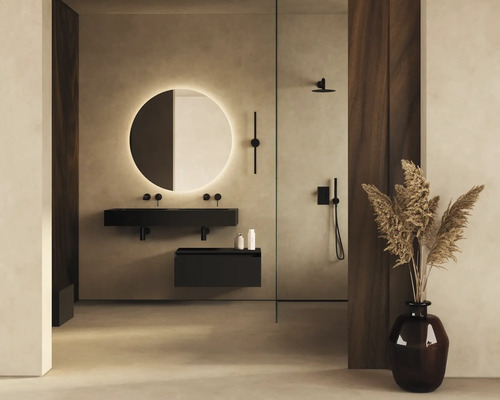 Modernt badrum med rund spegel, tvättställsskåp och dusch