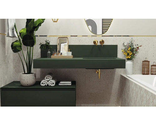 Badrum med handfat, underskåp, spegel och växter