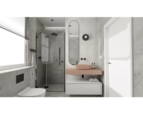 Badrum med dusch, handfat, spegel och toalett i en ljus design.