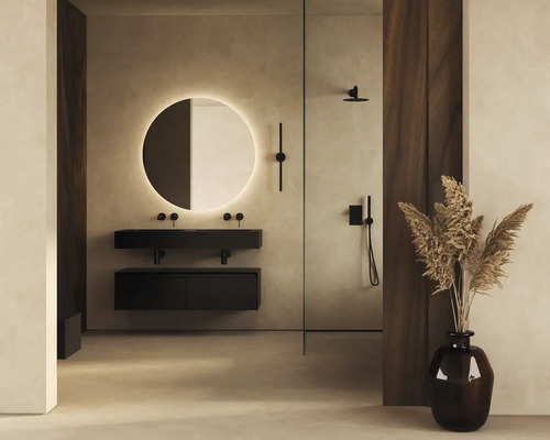 Modernt badrum med tvättställ, spegel med belysning och dusch.