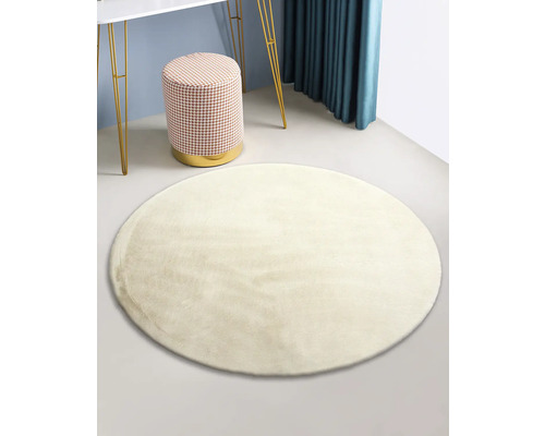 Rund matta i rum med pall och bord