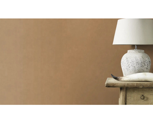 Dekorativ bordslampa på ett sängbord