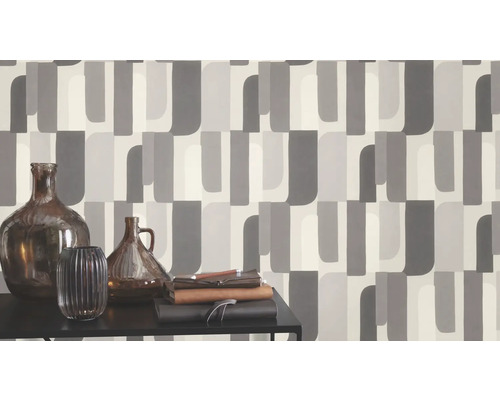 Fototapet med grafiskt mönster i gråtoner och vaser på ett bord