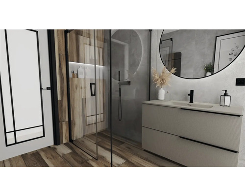 Modernt badrum med dusch, handfat och spegel