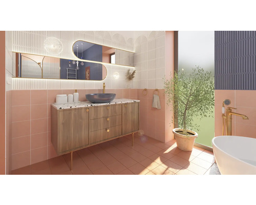 Badrum med handfat, spegel och dekorationer i en badrumsdesign