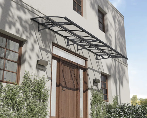 Ytterdörrstak av metall och plast på husfasad