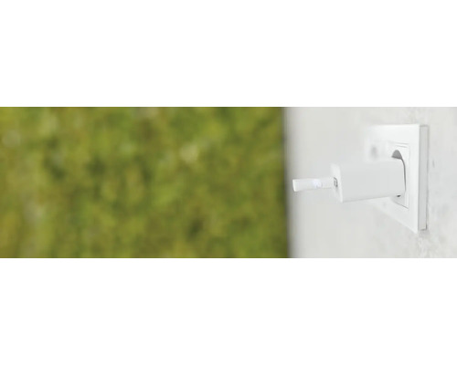 Adapter i ett vägguttag