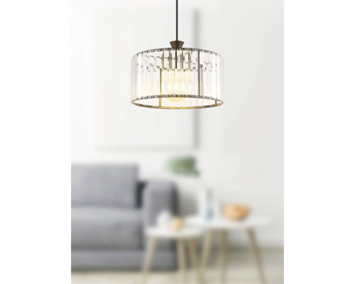 Taklampa med transparenta glasstavar och metallram i vardagsrummet