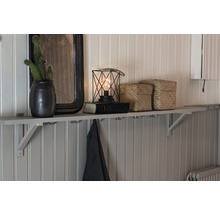 Dekorativ vägghylla med spegel, kaktus, lampa och förvaringslådor