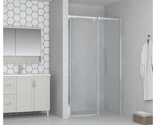 Modernt badrum med tvättställsskåp, spegelskåp och duschkabin