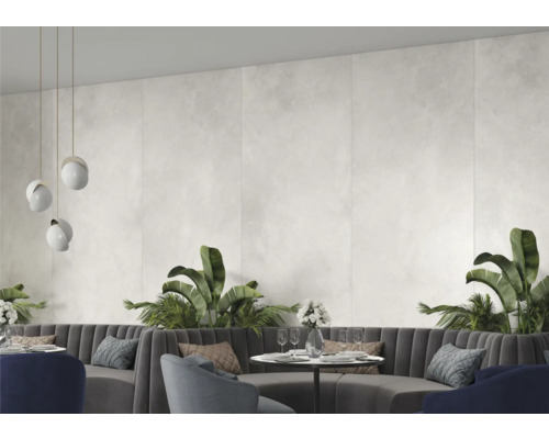 Restaurangscen med väggplattor, sittgrupper och växter