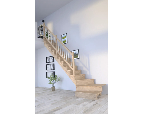 Trätrappa med räcke i ljust rum