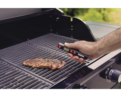 Tenneker logotyp. En biff ligger på en grill vars temperatur mäts med en grilltermometer.