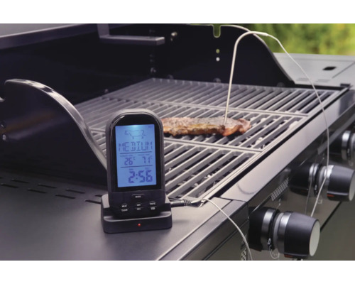 Digital grilltermometer med tillagningsnivåindikator på en grill