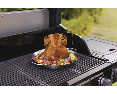 Grillad kyckling med grönsaker på en grill