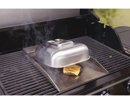 Grill med grillplatta, hamburgare, ost och lock