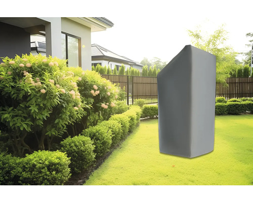 Skyddshuva för trädgårdsredskap på gräsmatta framför huset