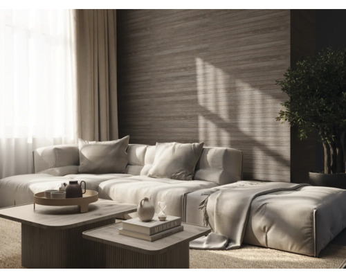 Vardagsrum med modulsoffa, soffbord och krukväxt