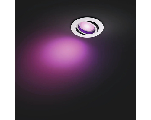 Takmonterad spotlight med violett ljuskägla