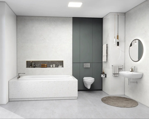 Modernt badrum med badkar, toalett, handfat och spegel