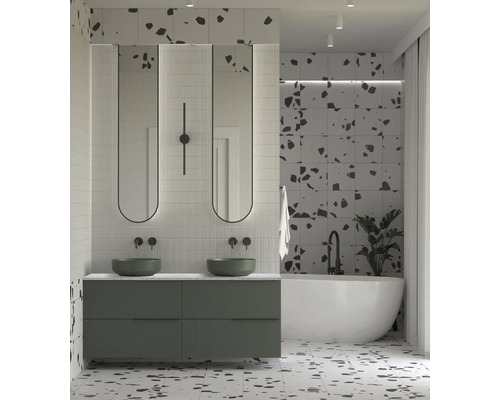 Ljust badrum med dubbla handfat, speglar, badkar och plattor i terrazzostil