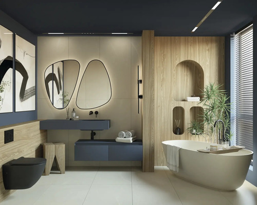 Modernt badrum med fristående badkar, handfat, spegel och toalett.