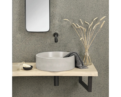 Badrumskommod med runt tvättställ, armatur och spegel