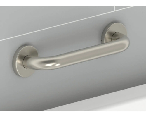 Metallhandtag monterat på väggen