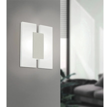 Modern vägglampa med geometrisk design för stämningsfull belysning