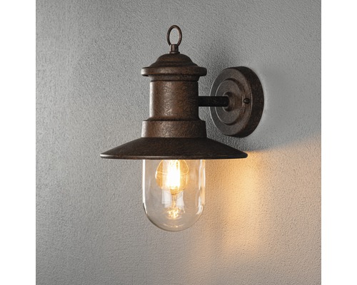 Vägglampa för utomhusbruk med klart glas och metalldetaljer för montering