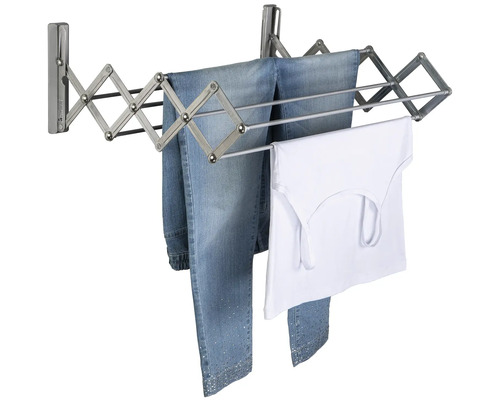 Väggmonterad torkställning med kläder