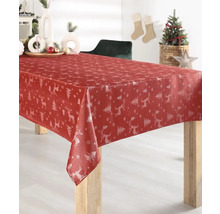 Festlig duk med hjort- och julgransmönster på ett matbord