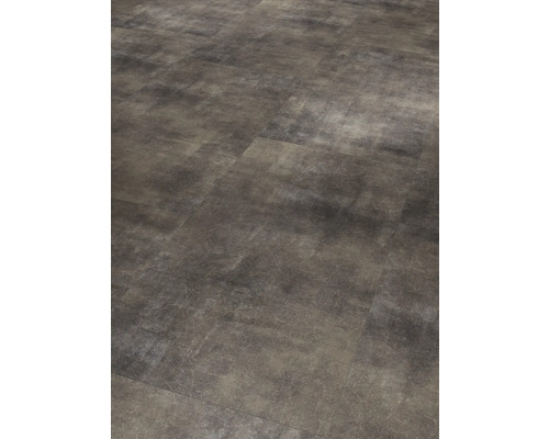 Närbild av vinylgolvplattor med stendekor