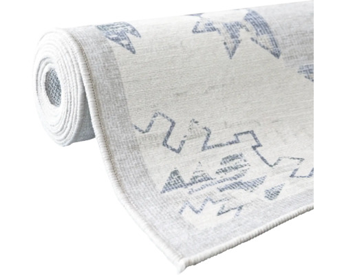 Rullad matta med mönster