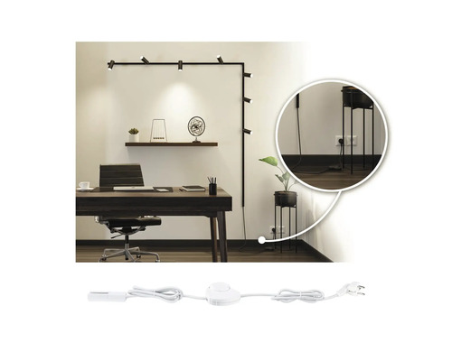 Scen av ett arbetsrum med skrivbord och väggmonterad spårspotlight inklusive matningskabel