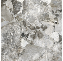 Närbild av en grå keramisk platta med marmorlook