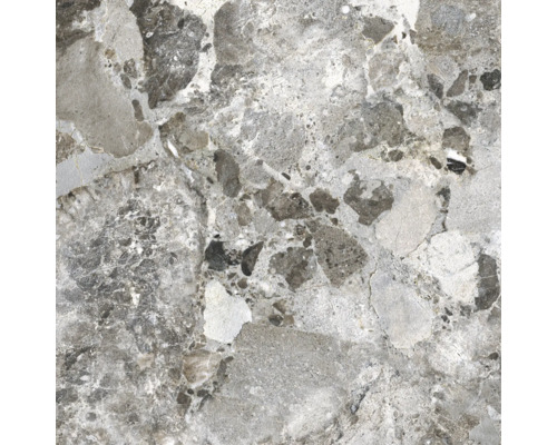 Närbild av en grå keramisk platta med marmorlook