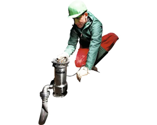 Arbetare med Metabo pump för byggnadsarbete