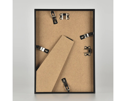 Baksidan av en tavelram med fästen och stöd