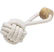 Hundleksak av repknut och trä