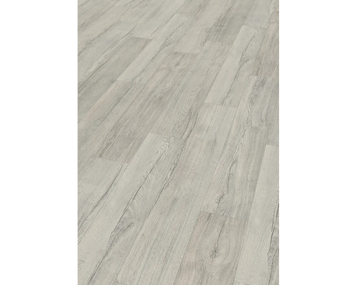 Ljus laminatgolvvy med trästruktur.