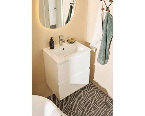 Badrumskommod med två lådor, blandare och rund spegel