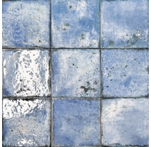 Nio kvadratiska, oglaserade väggplattor med oregelbundet mönster