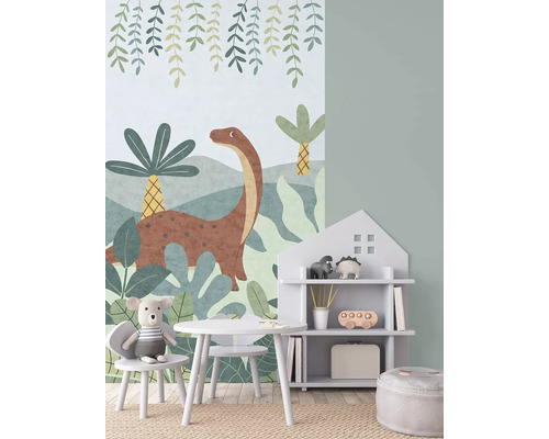 Barnrum med dinosaurietapet, bord, stol och hylla i husform