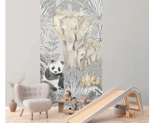 Barnrum med fotovägg med djungelmotiv, fåtölj och rutschkana