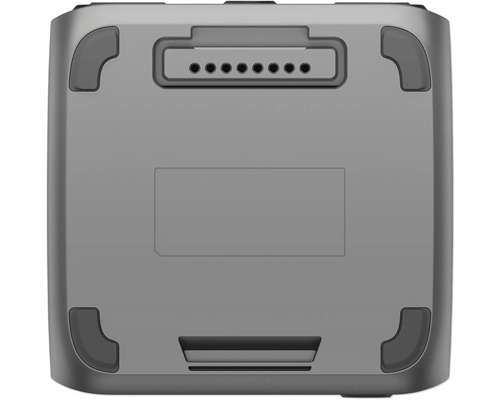 Undersida av batteripaket med kontakter och gummifötter