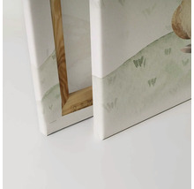 Detaljvy av två canvastavlor med kilram