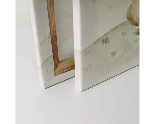 Detaljvy av två canvastavlor med kilram