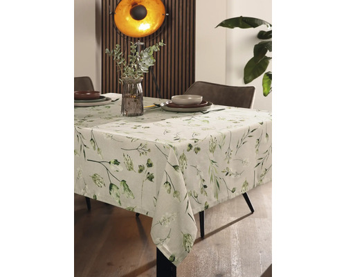 Dukat matbord med bordsduk med blommönster