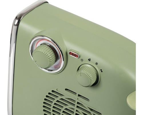 Detaljvy av en värmefläkt med vred för temperatur- och effektreglering.